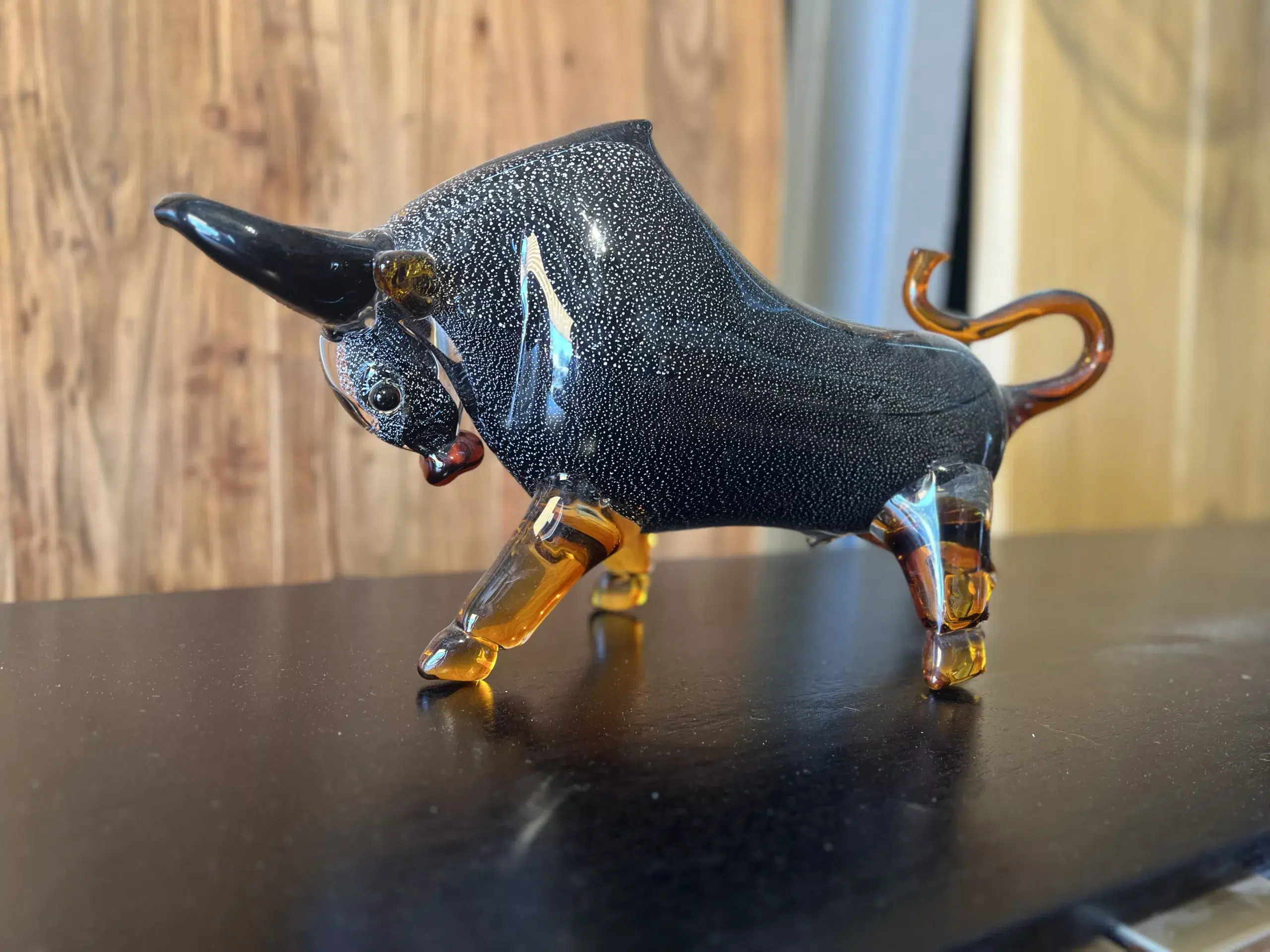 A modern glass bull sculpture