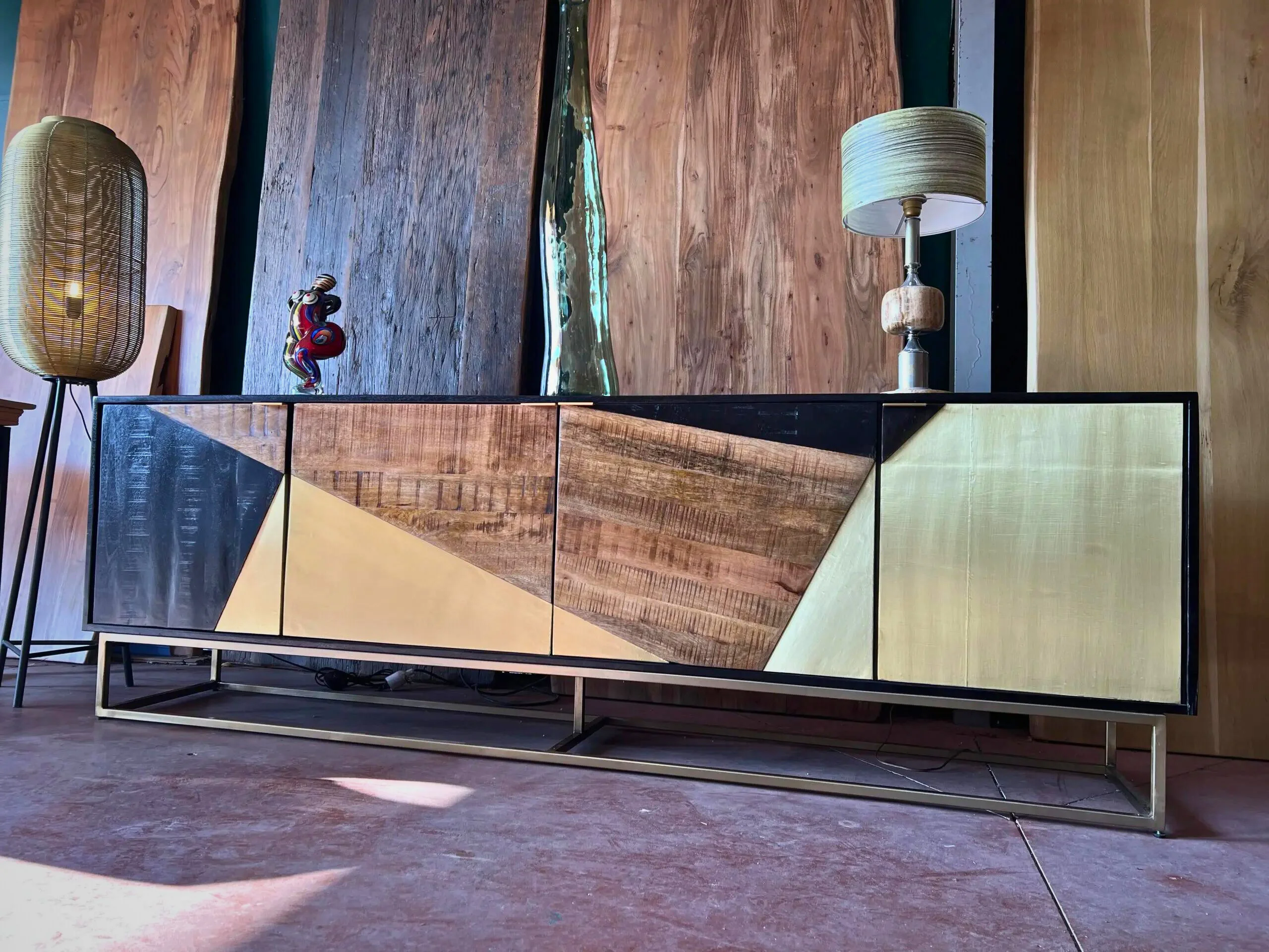 A solid wood and metal sideboard in a shop