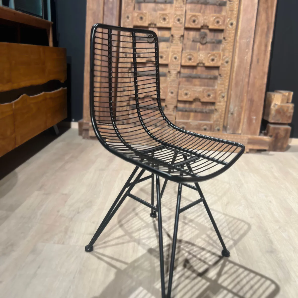 A black metal industrial chair