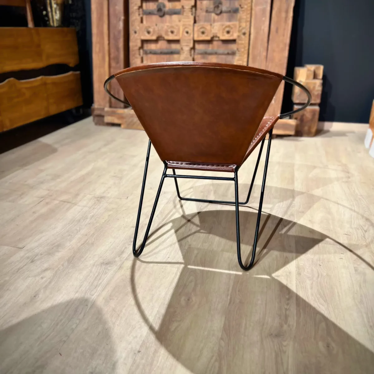 A contemporary designer armchair in a workshop