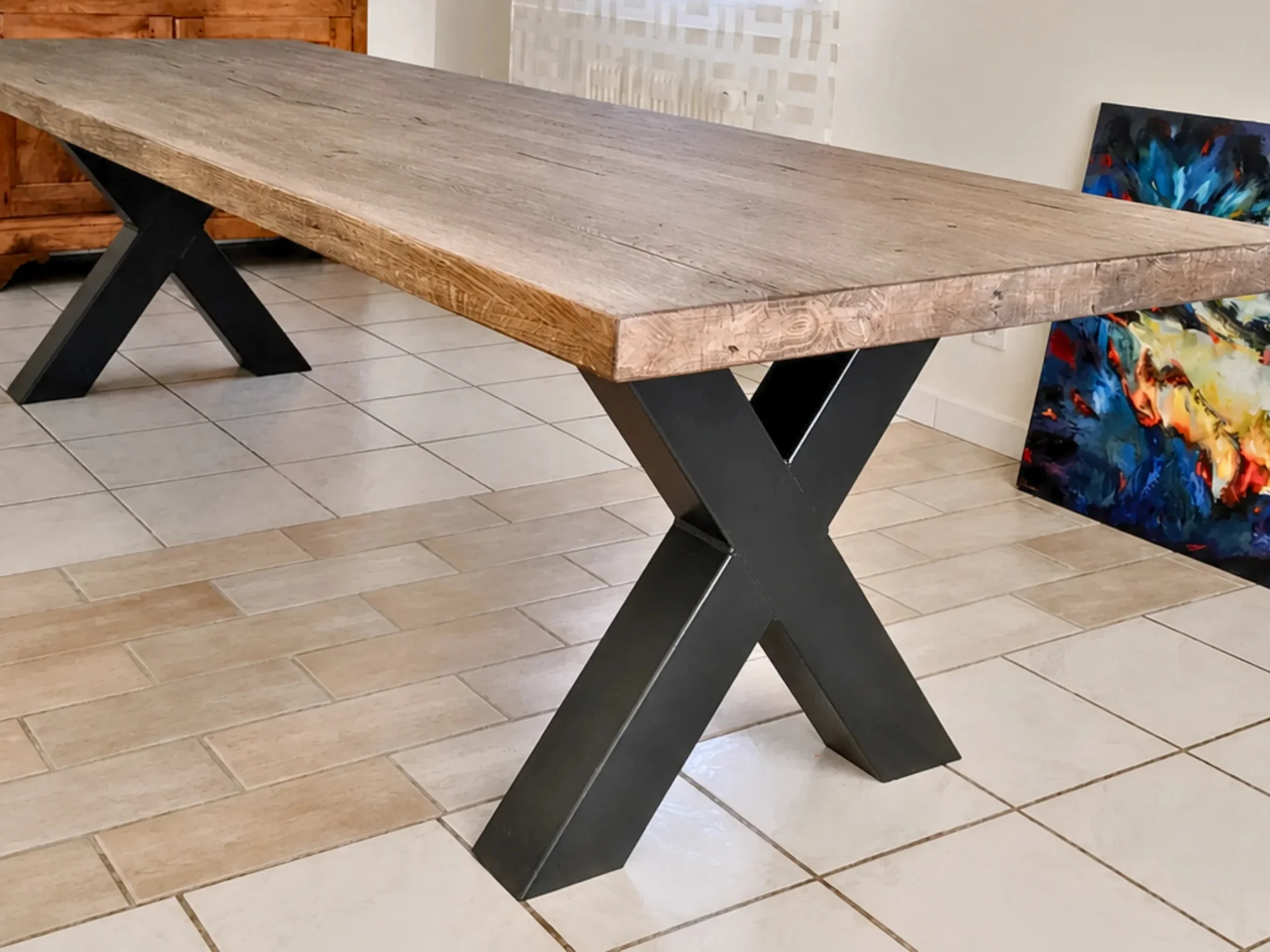Un pied de table en croix