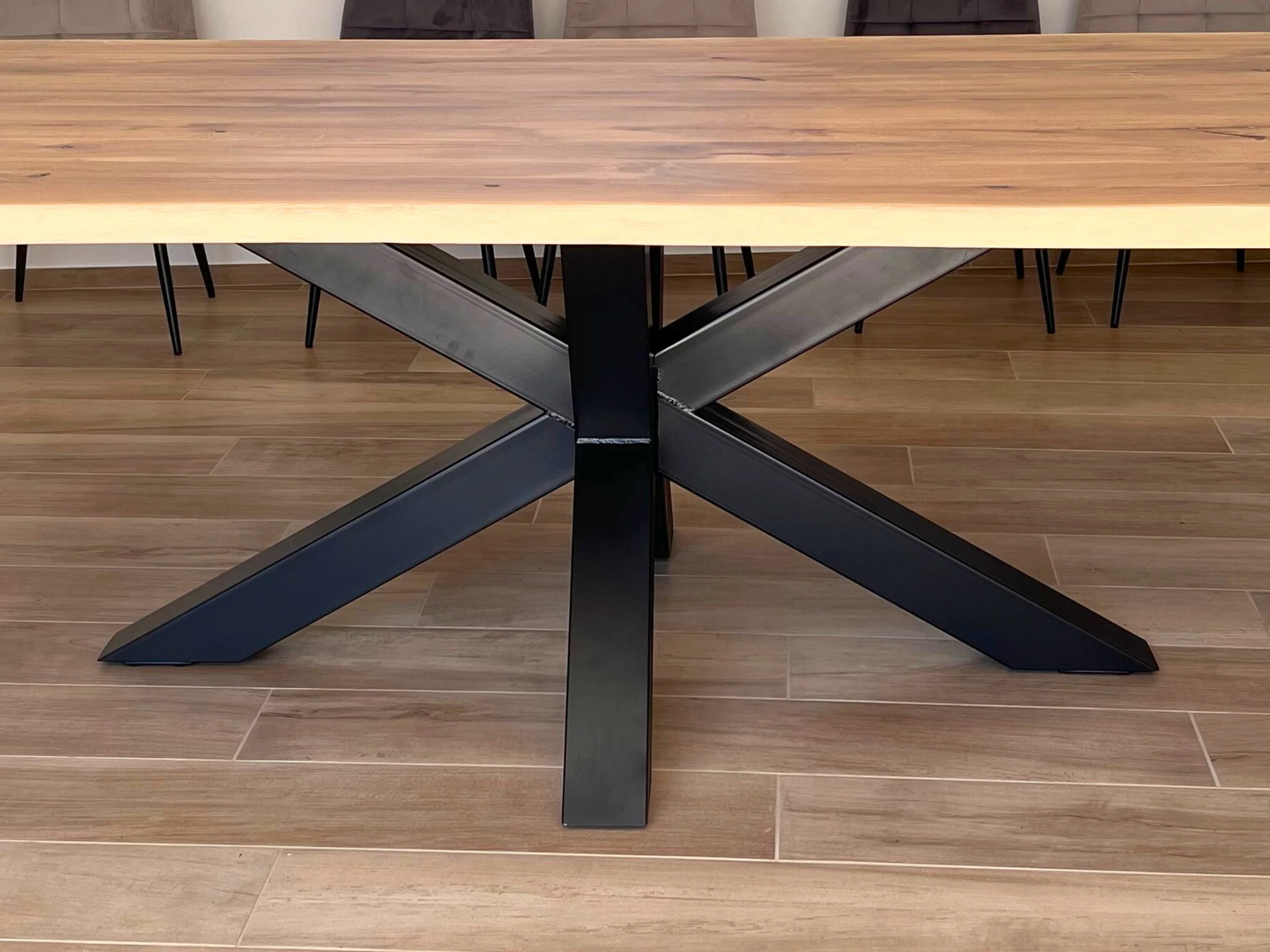 A table with a black metal leg