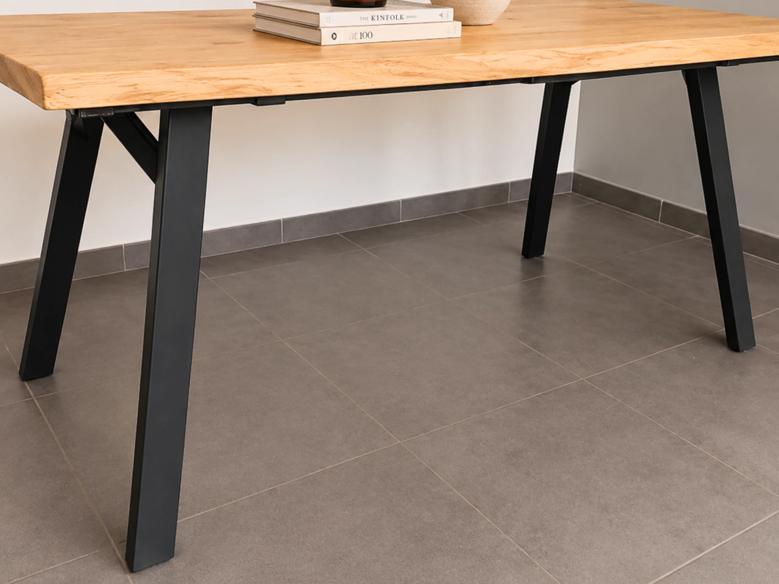 A black metal table leg