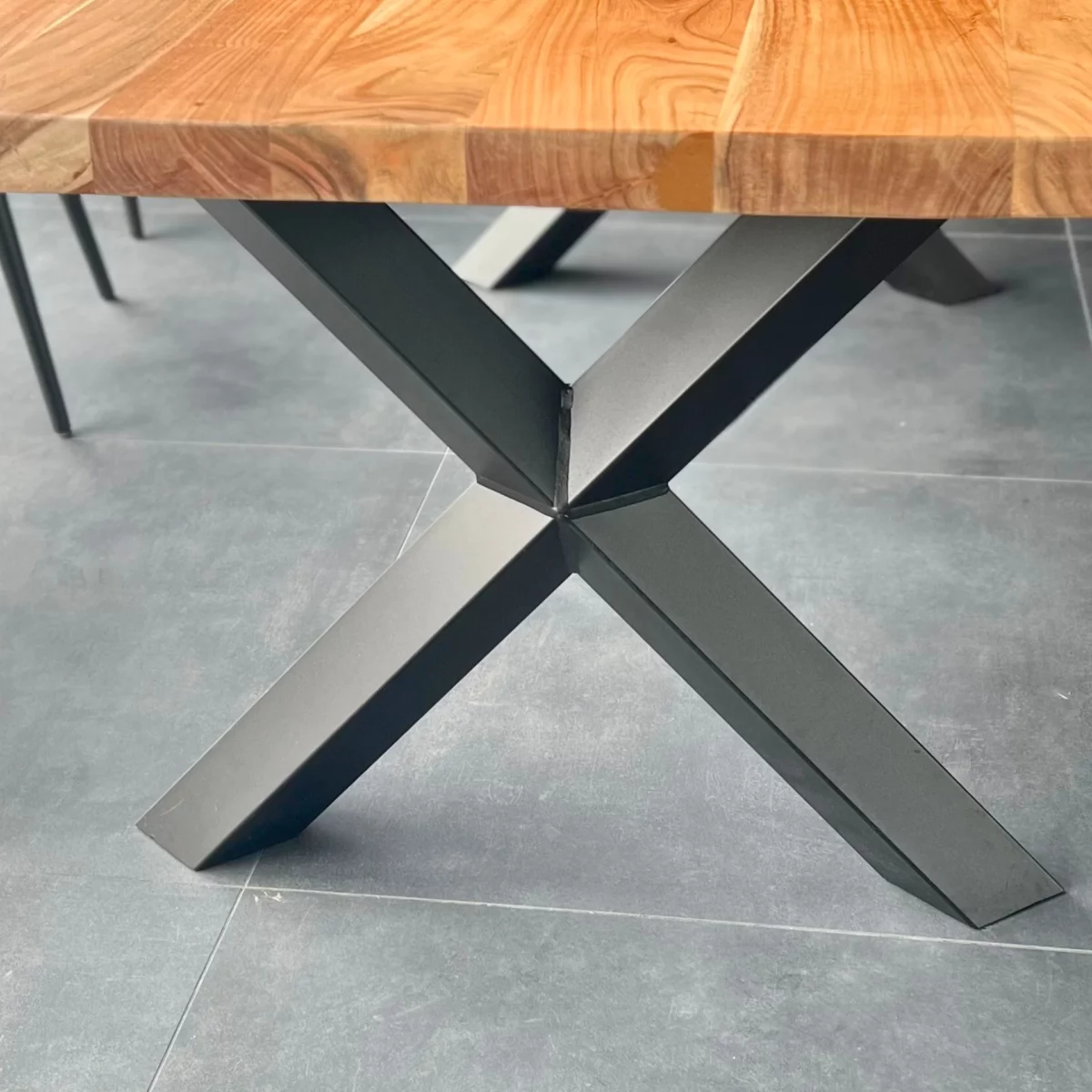A custom black steel table leg