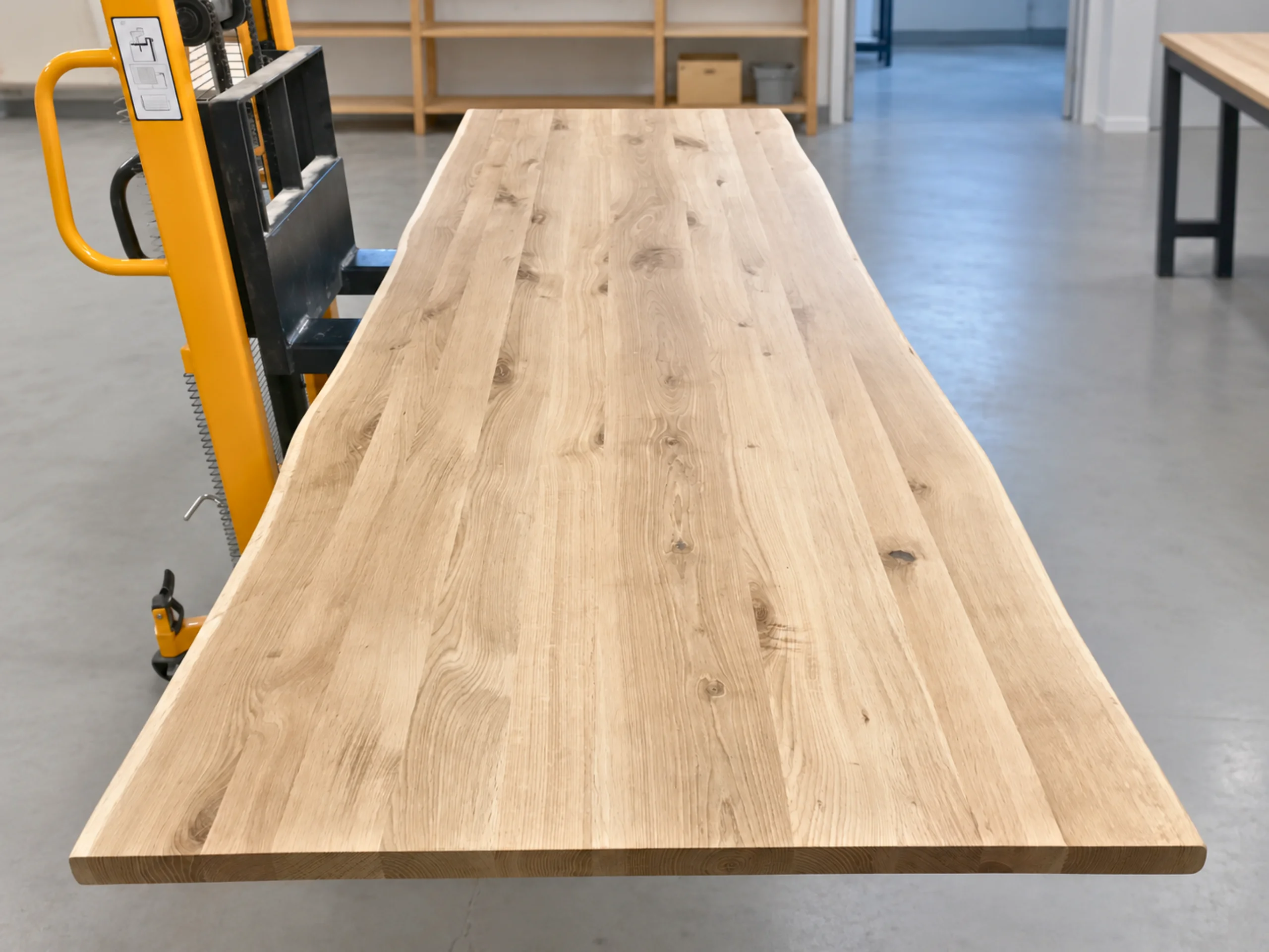 A light oak workbench in a workshop