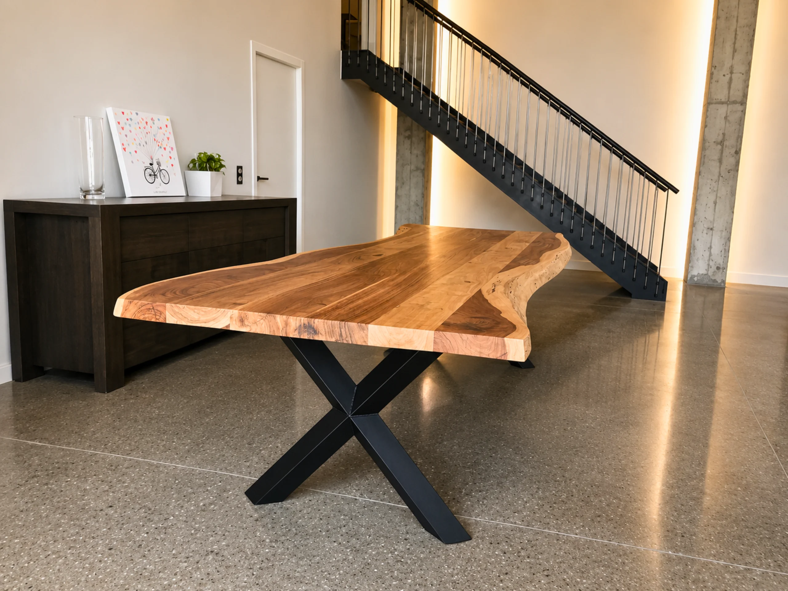 Une table à manger pied croisé