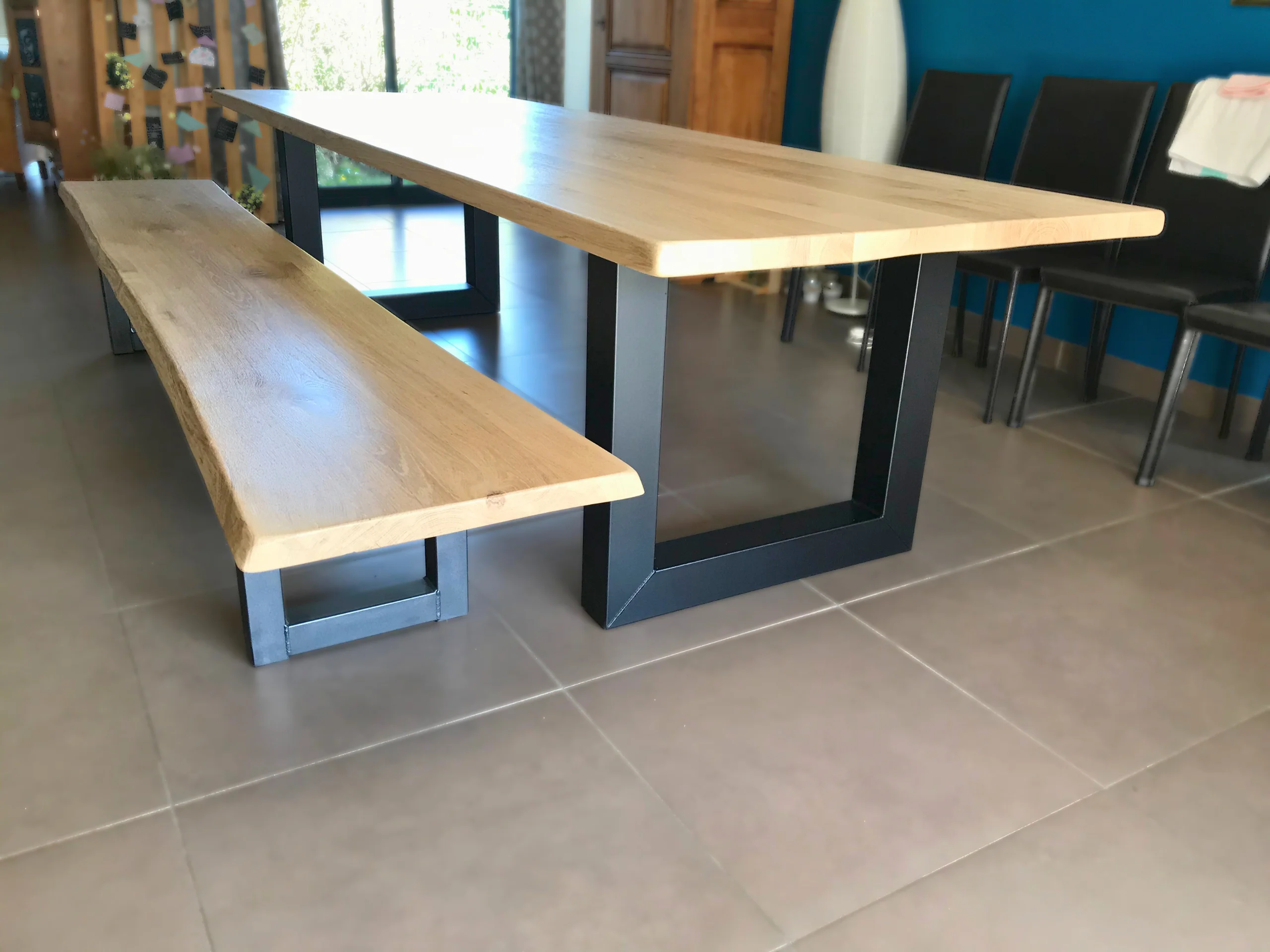 A dining table with U-shaped legs