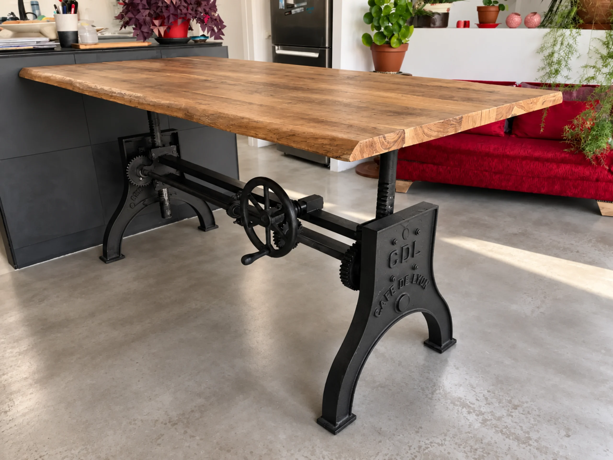 A height-adjustable dining table